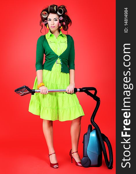 Shot of a funny  woman housewife dressed in retro style. Shot of a funny  woman housewife dressed in retro style.