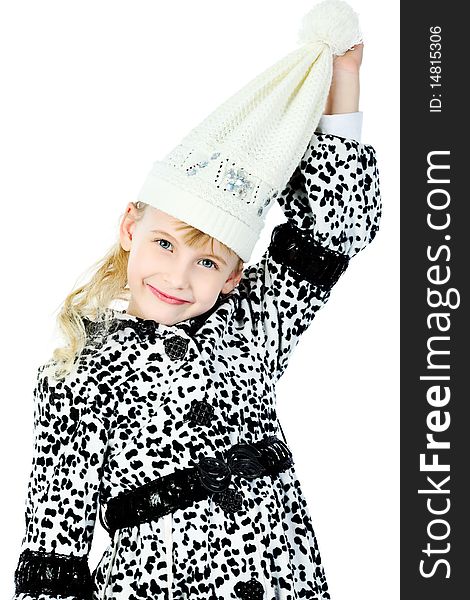 Portrait of a cute girl in a coat and cap. Isolated over white background. Portrait of a cute girl in a coat and cap. Isolated over white background.