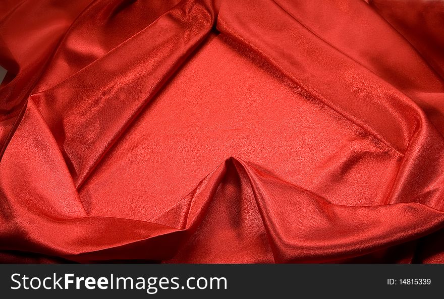 Close-up picture of elegant and soft red fabric fold. Close-up picture of elegant and soft red fabric fold