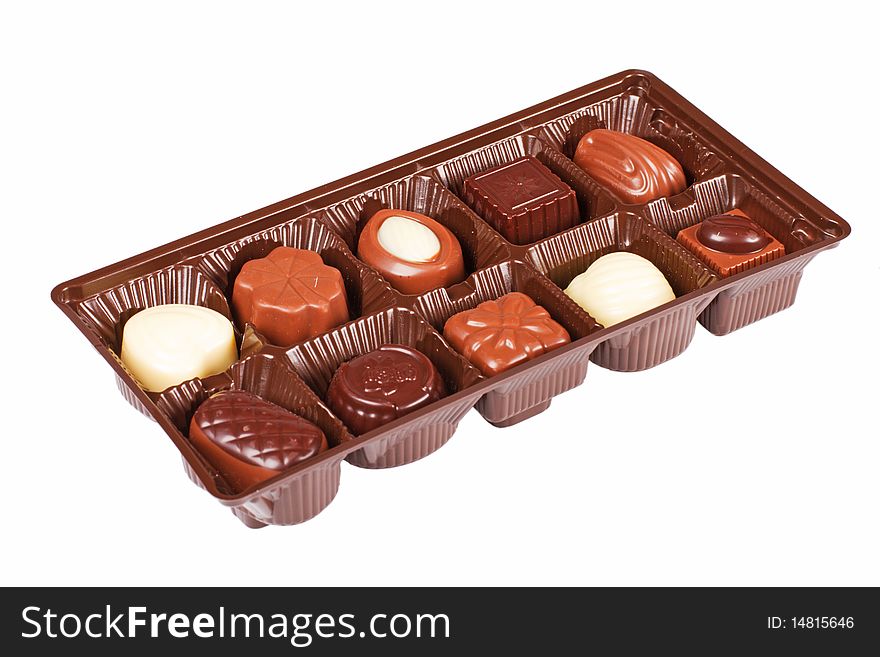 Box of assorted chocolates on white background