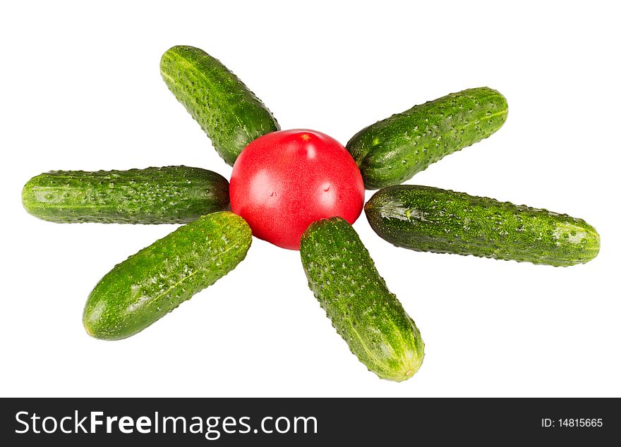 One tomato and six cucumbers sun on white background. One tomato and six cucumbers sun on white background