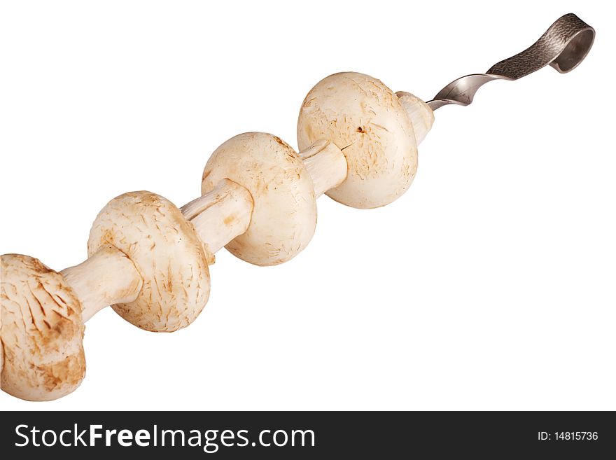 Grilled button mushrooms isolated on white