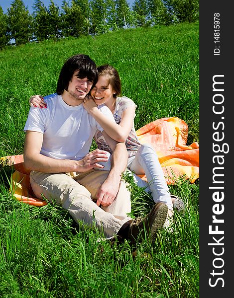 Girl and boy on grass