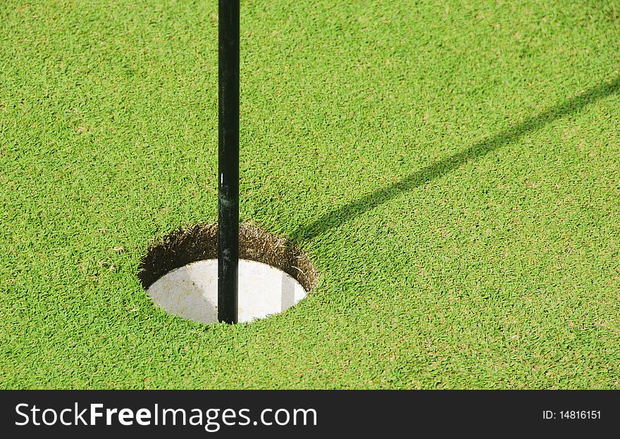 Golf hole in a beautiful golf course in the Philippines. Golf hole in a beautiful golf course in the Philippines