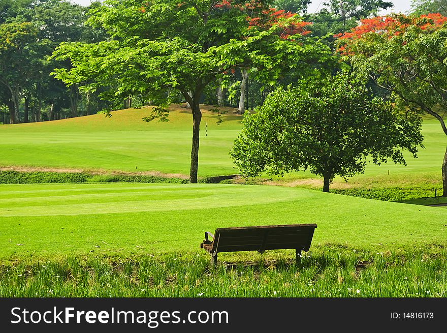 Bench in a beautiful golf course in the Philippines. Bench in a beautiful golf course in the Philippines