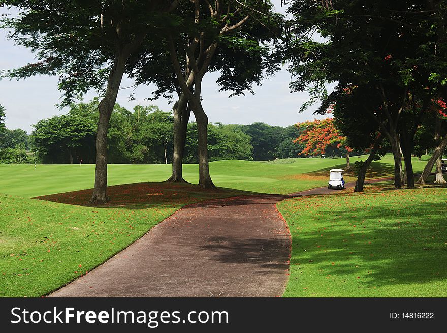 Golf carts in a beautiful golf course in the Philippines. Golf carts in a beautiful golf course in the Philippines