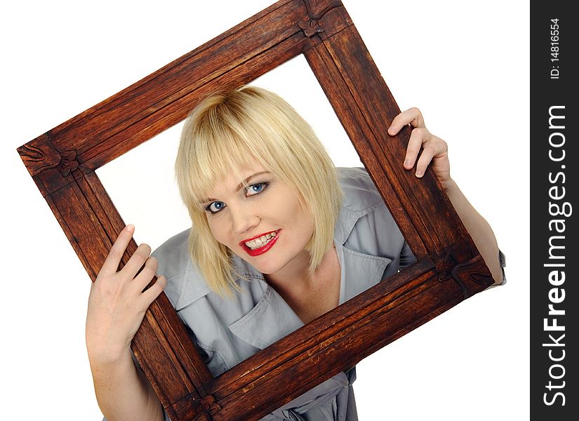 Cute blond girl poses with a picture frame. Cute blond girl poses with a picture frame