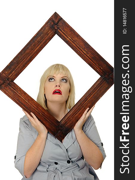 Cute blond girl poses with a picture frame. Cute blond girl poses with a picture frame