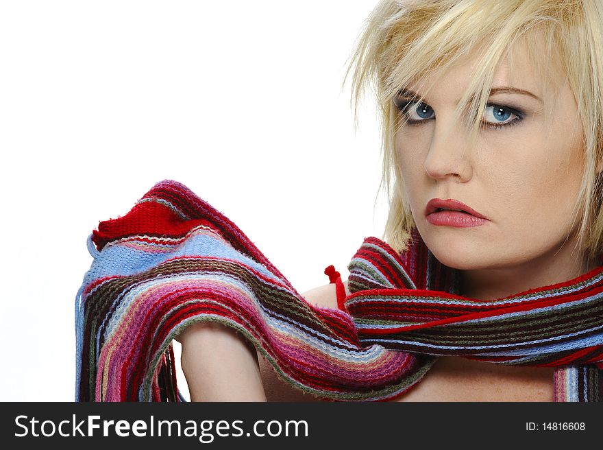 Gorgeous blond poses with her winter scarf. Gorgeous blond poses with her winter scarf