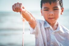 Children Holding Plastic Straw That He Found On The Beach Stock Photos Children Holding Plastic Straw That He Found On The Beach Stock Photos