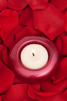 Candle And Rose Petals Stock Photography