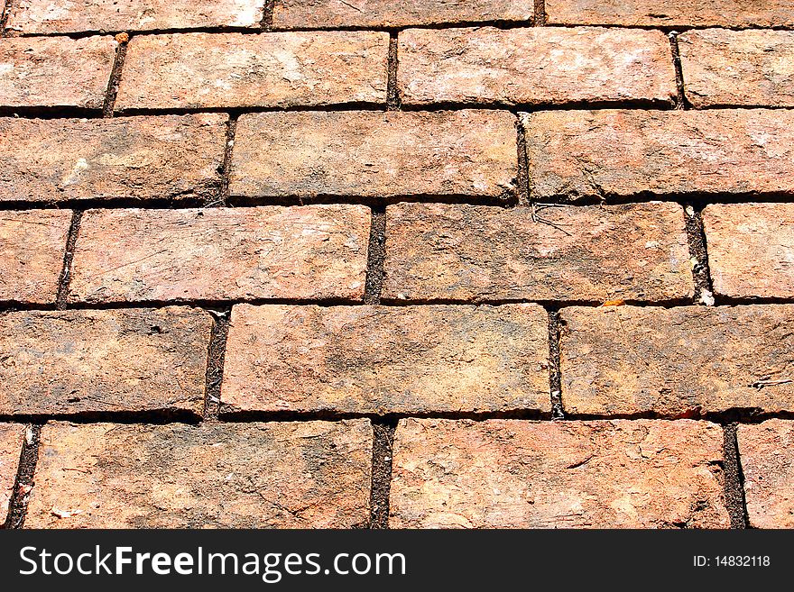 Abstract background with old brick way.