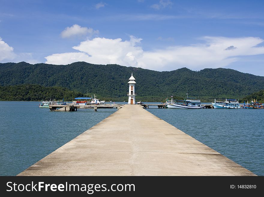 White lighthouse in bay on Koh Chang island, Thailand