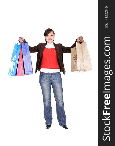 Young adult brunette woman with shopping bags