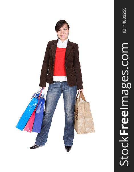 Young adult brunette woman with shopping bags