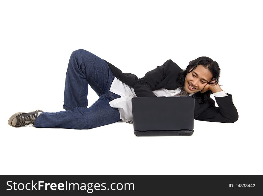 Long hair man laying on the floor, working with laptop, isolated on white. Long hair man laying on the floor, working with laptop, isolated on white