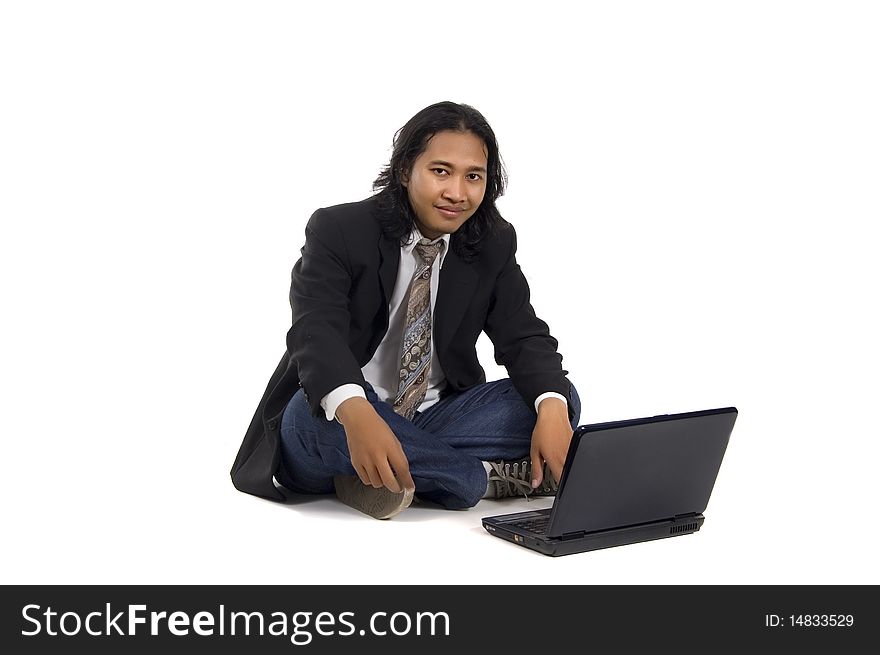 Long hair man sit on the floor, working with laptop, isolated on white. Long hair man sit on the floor, working with laptop, isolated on white