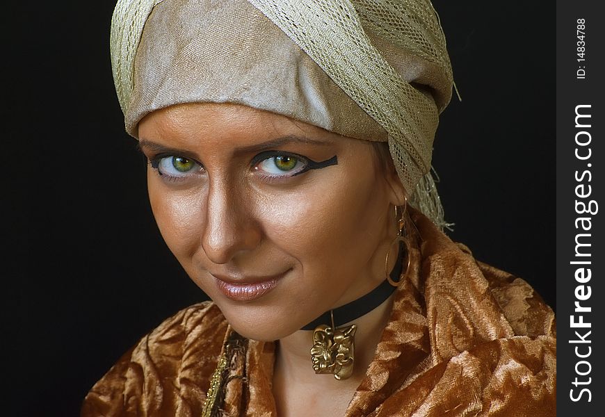 Woman with east gold make-up