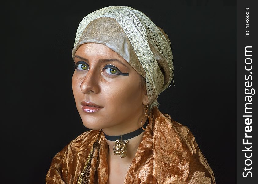 Woman with east gold make-up