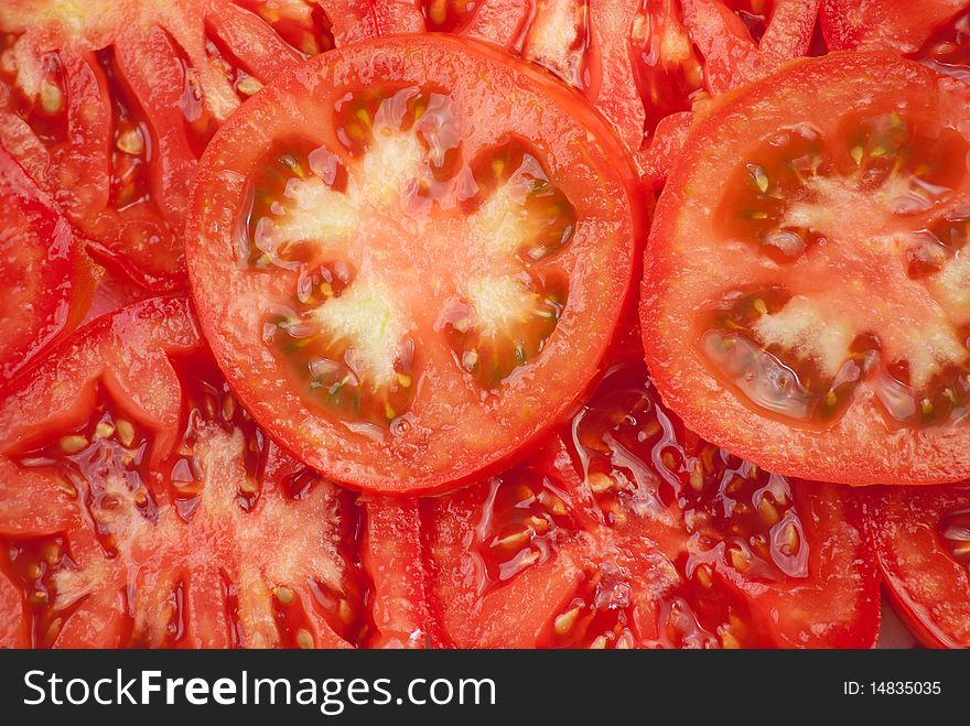 Background of peaces of red tomato. Background of peaces of red tomato