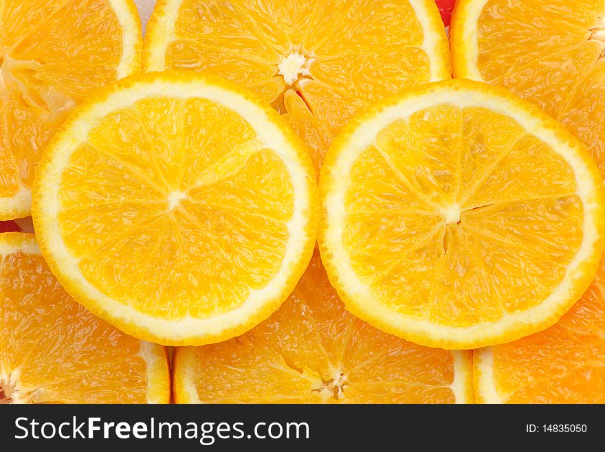 Background of pieces of juicy orange