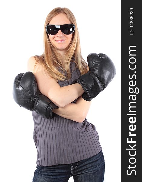 Pretty young lady smiling with boxing gloves. Isolated on white background. Pretty young lady smiling with boxing gloves. Isolated on white background