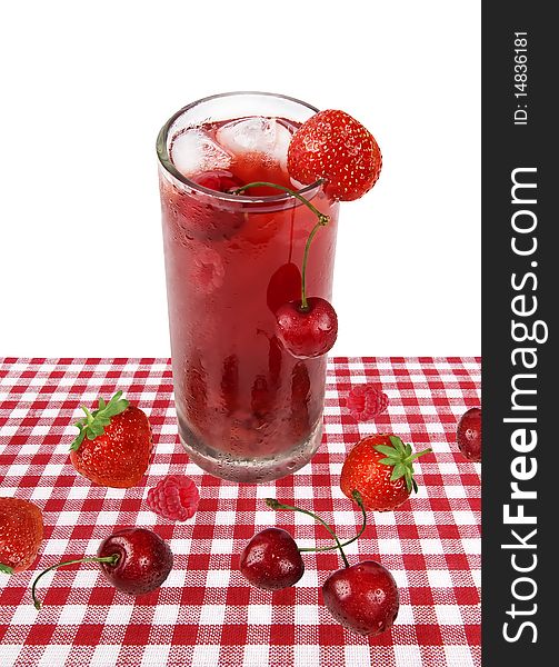 Red fruit nonalcoholic cocktail / beverage on picnic table cloth. Red fruit nonalcoholic cocktail / beverage on picnic table cloth.