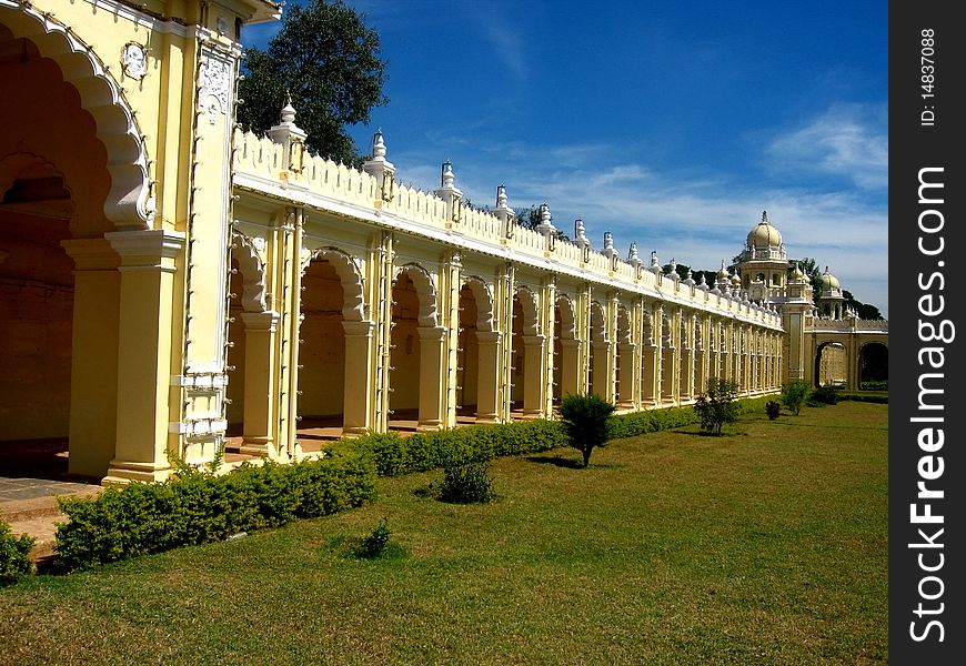 A beautiful and long wall of a Mysore palace in India. A beautiful and long wall of a Mysore palace in India.