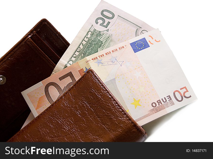 Fifty dollar and euro banknotes in wallet