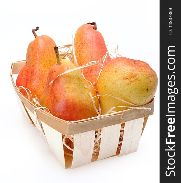 Pears in the basket isolated on white