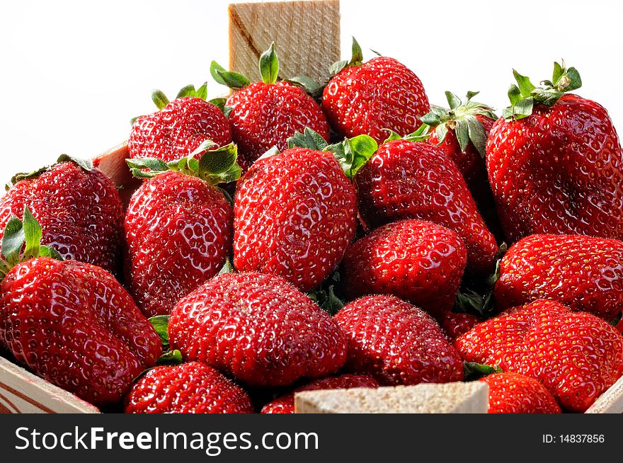 Fresh Ripe Perfect Strawberries in wooden box