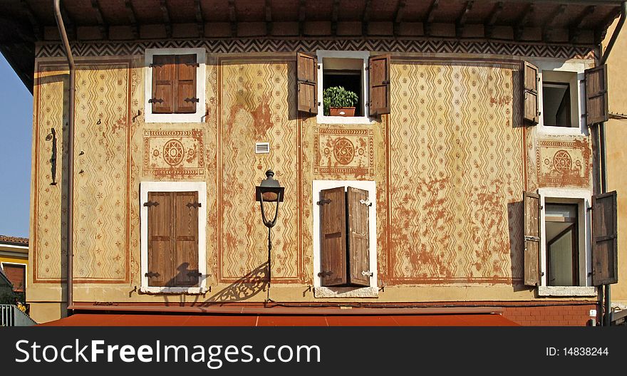 Bardolino, facade detail in the old town of Bardolino, Veneto, Italy, Europe