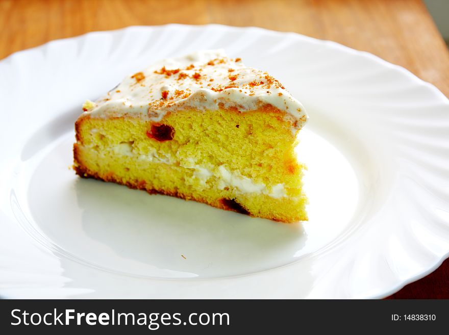 Slice of homemade cake on plate