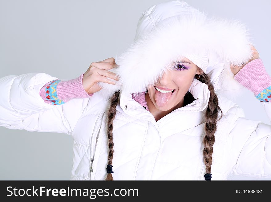 Winter happy young woman isolated