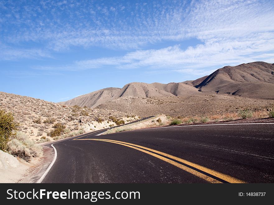 Long strecth of winding desert highway