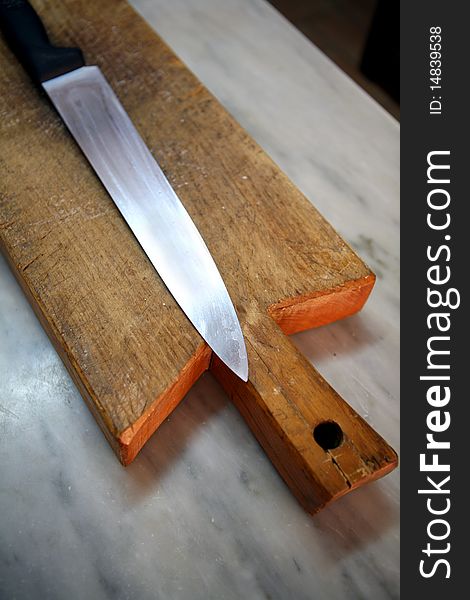 Knife on the wood table