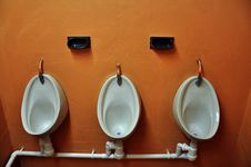 Urinals And Soap Holders Royalty Free Stock Photo Urinals And Soap Holders Royalty Free Stock Photo