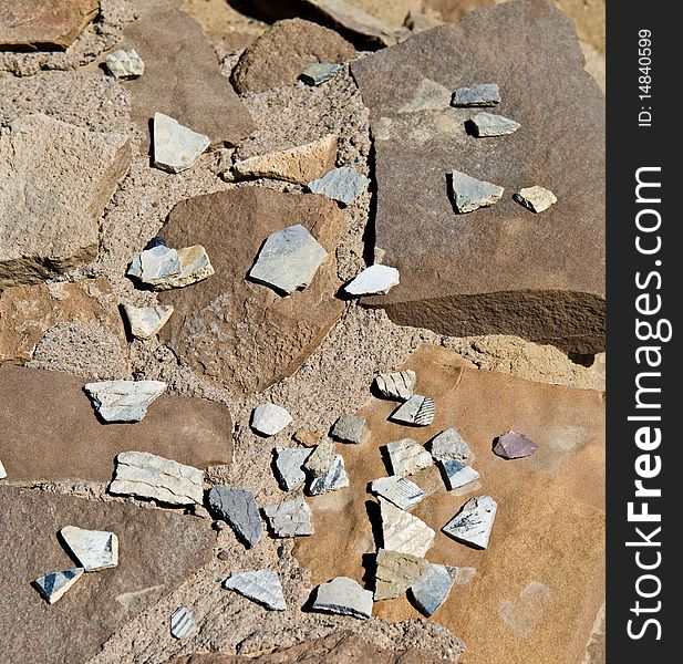 Shards possibly left by the Chacoan peoples c. 800-900 AD as a tribute to someone who has died, at Kin Bineola ruins, Chaco Culture National Hiastoric Park. Shards possibly left by the Chacoan peoples c. 800-900 AD as a tribute to someone who has died, at Kin Bineola ruins, Chaco Culture National Hiastoric Park.