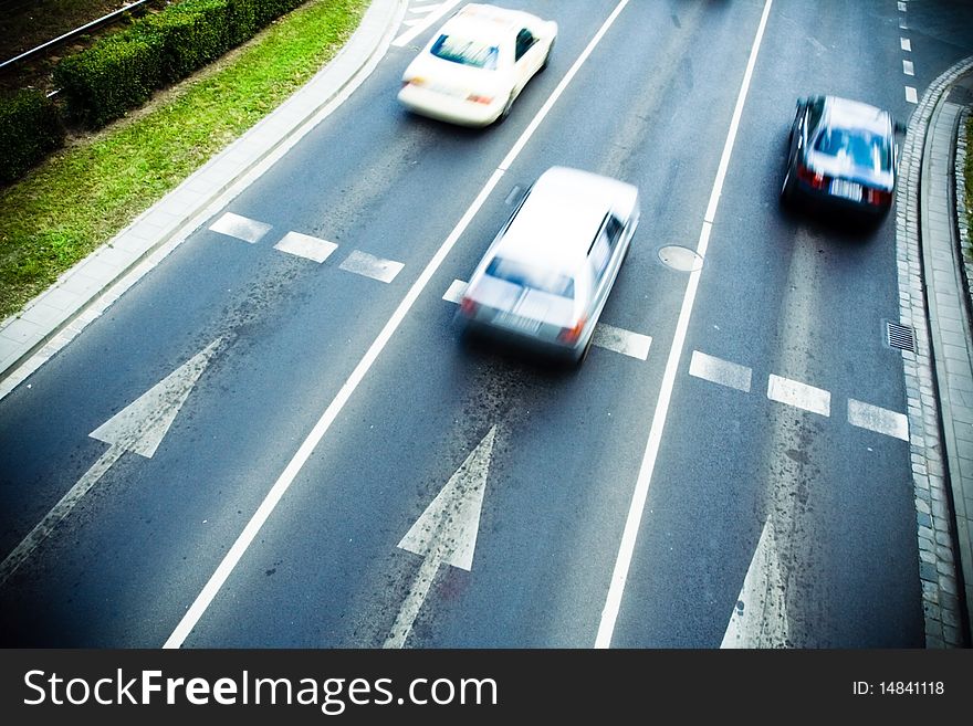 Motion blur of cars on city street. Motion blur of cars on city street