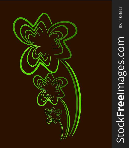 Three-leaf clovers over brown background. Three-leaf clovers over brown background