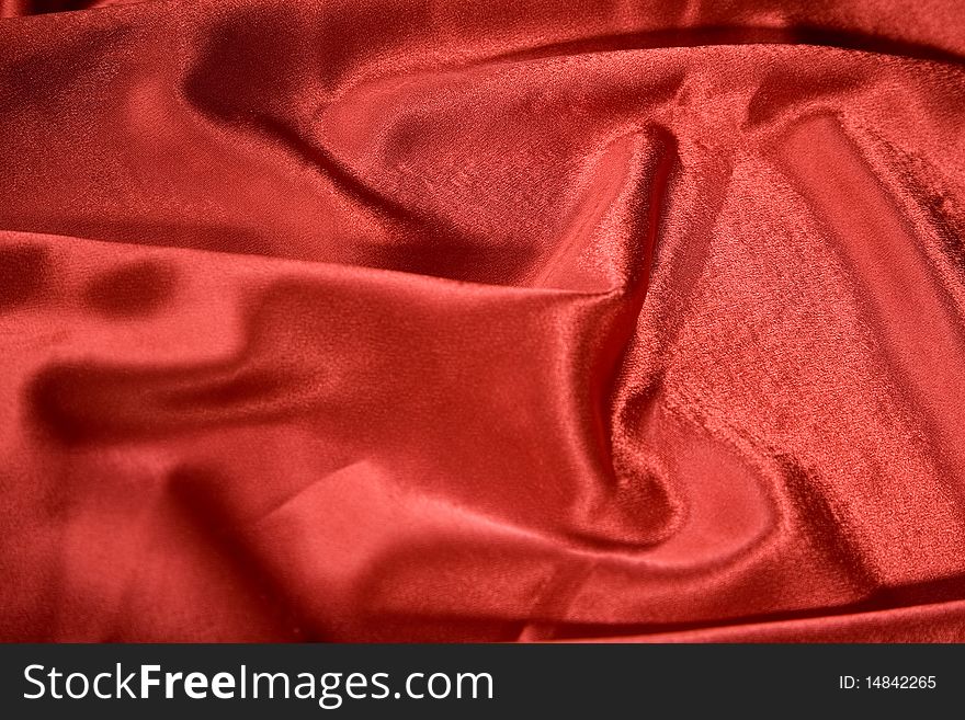 Close-up picture of elegant and soft red fabric fold. Close-up picture of elegant and soft red fabric fold