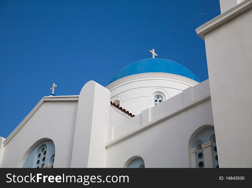 A picture of a white and blue church with a blue background. A picture of a white and blue church with a blue background.