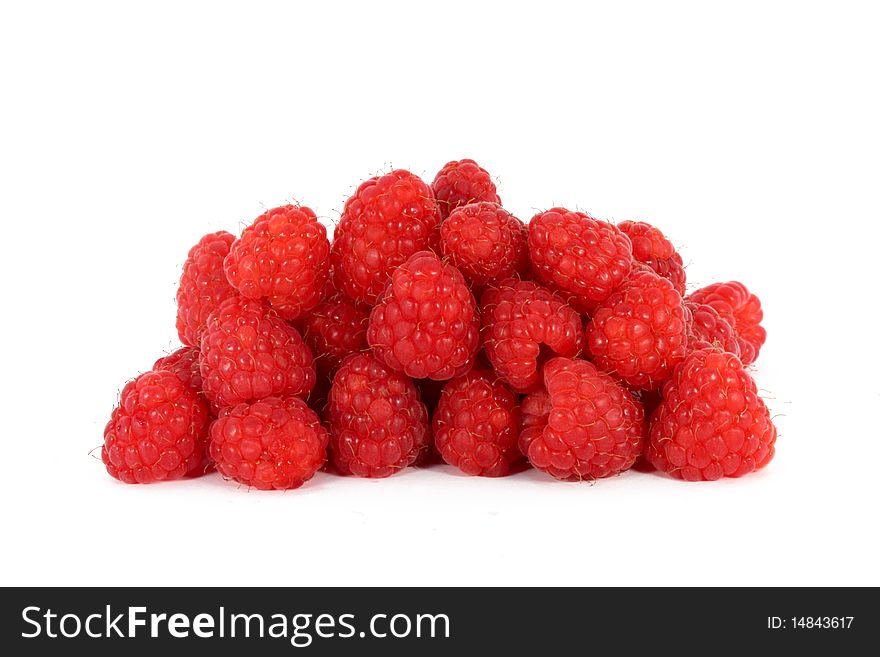 Heap of fresh raspberries isolated on white