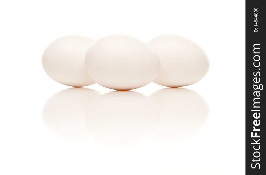 Three White Eggs Isolated on a White Background. Three White Eggs Isolated on a White Background.