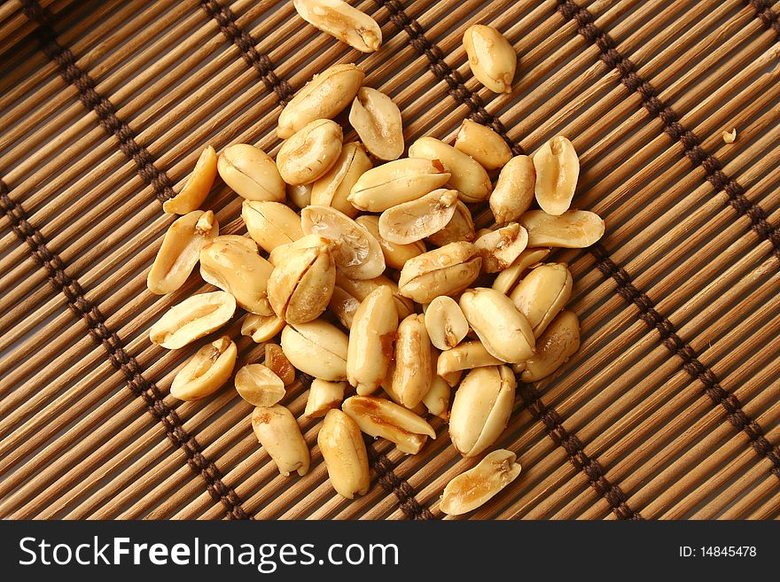 Salted peanuts forming background image