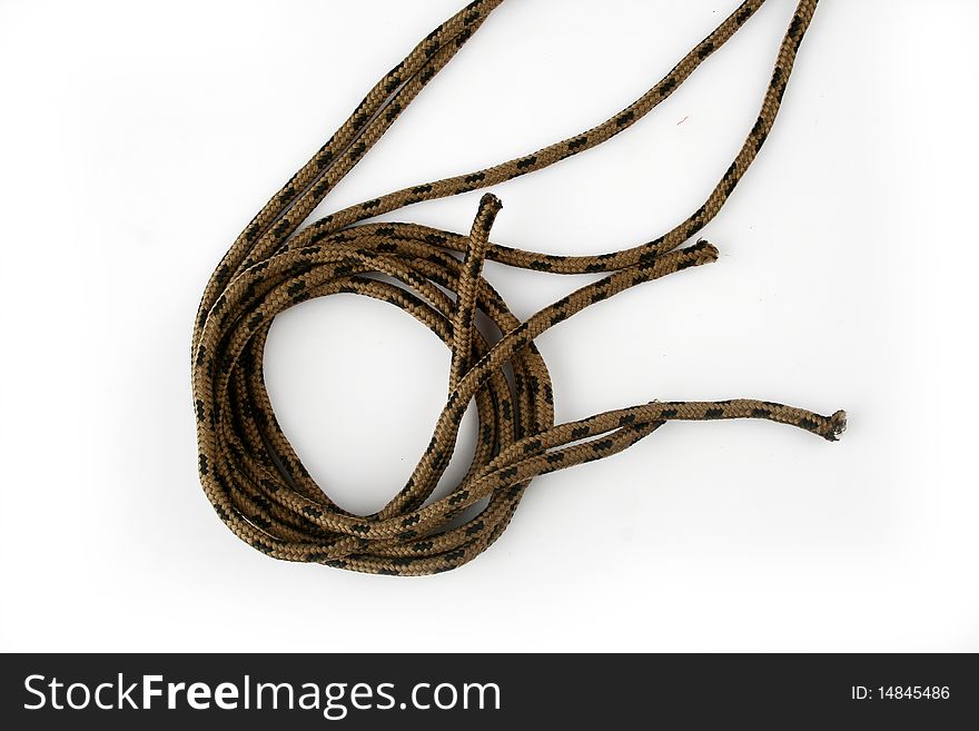 Rope with knot close up. Isolated on white background.