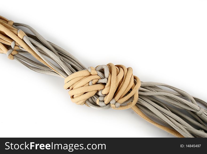 Rope with knot close up. Isolated on white background.