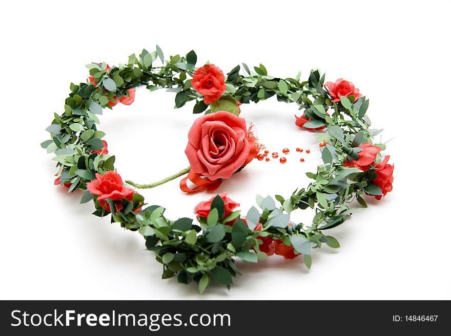 Wreath from red roses in heart form. Wreath from red roses in heart form