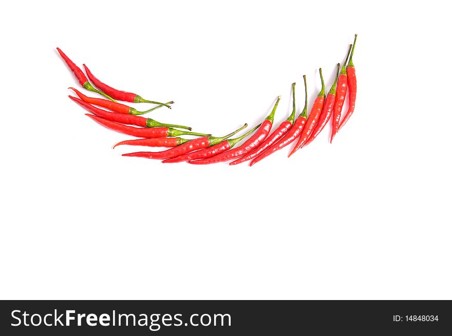 Edible red peppers isolated on a white background. Edible red peppers isolated on a white background.