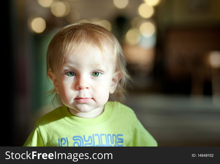 Portrait of a little boy indoors.